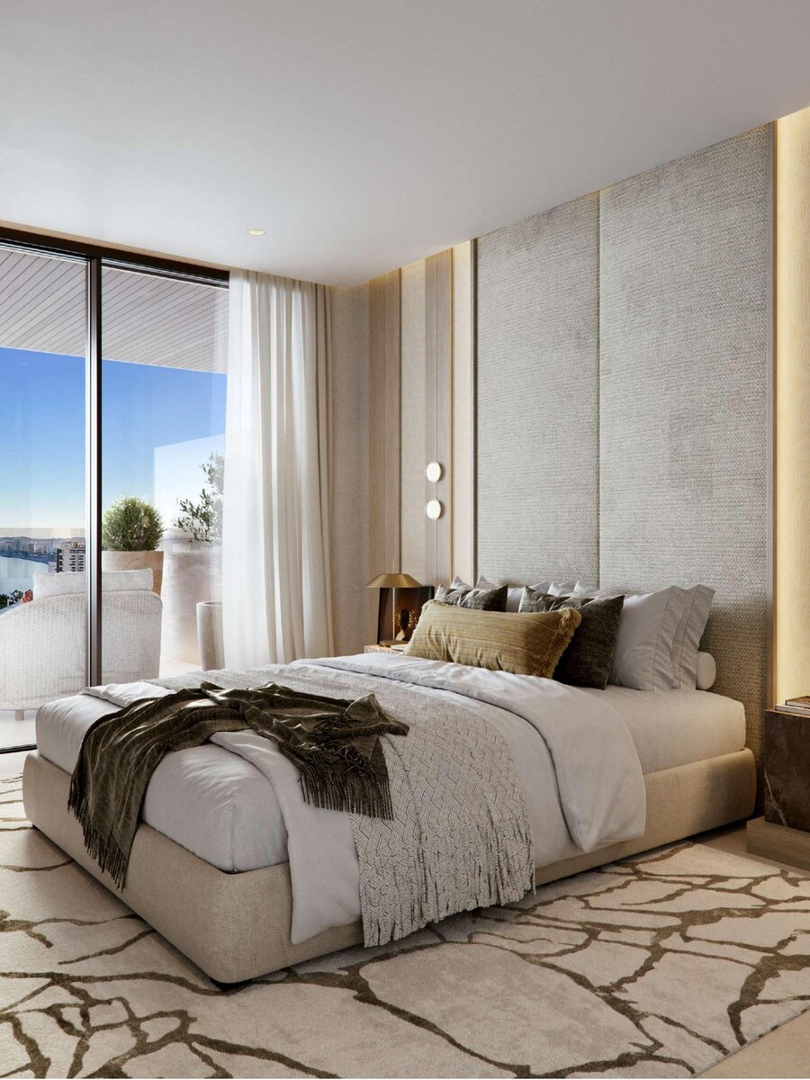 ÓLEO Fuengirola 2-bedroom luxury dining and master bedroom with sea view terrace
